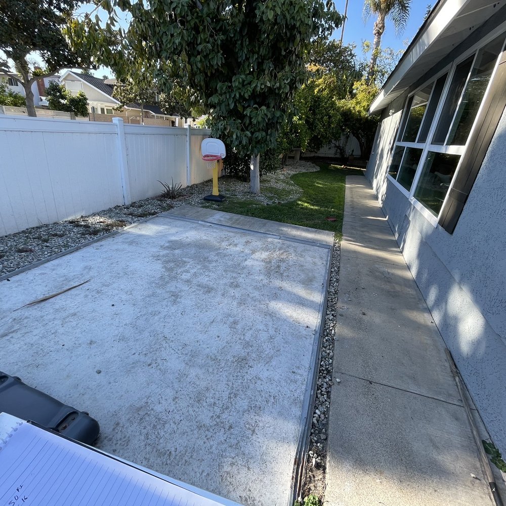 Before picture of side yard. Before picture of side yard.