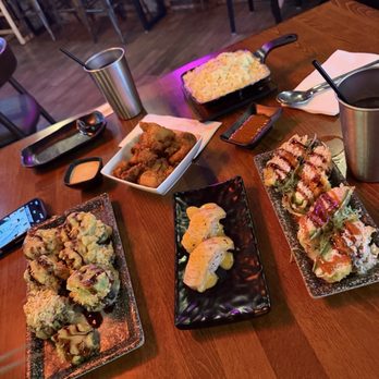 Zu Izakaya - JALAPENO VEGAS ROLL on left, salmon nigiri middle, JALAPEÑO POPPER far right. CHICKEN KARAAGE on the middle back, BUTTER CORN on top right - Sushi Bars Near Me - Gilbert, Arizona Zu Izakaya - JALAPENO VEGAS ROLL on left, salmon nigiri middle, JALAPEÑO POPPER far right. CHICKEN KARAAGE on the middle back, BUTTER CORN on top right - Sushi Bars Near Me - Gilbert, Arizona