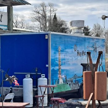 Ship Out - a blue trailer with a painting on it - Food Trucks Near Me - Astoria, Oregon