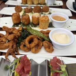 Tater Tots, Mushroom Arancini, Crispy Calamari, Tuna Tartare Taco* Tater Tots, Mushroom Arancini, Crispy Calamari, Tuna Tartare Taco*