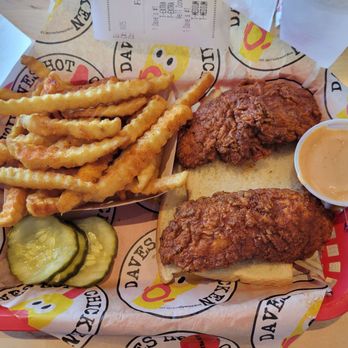 Dave's Hot Chicken - #1 is 2 pieces of chicken tenders and fries with 2 little white bread slices and a few pickle slices and sauce. - Chicken Shop Near Me - Jeffersonville, Indiana Dave's Hot Chicken - #1 is 2 pieces of chicken tenders and fries with 2 little white bread slices and a few pickle slices and sauce. - Chicken Shop Near Me - Jeffersonville, Indiana