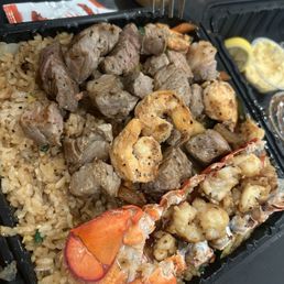 Steak, lobster and shrimp plate Steak, lobster and shrimp plate