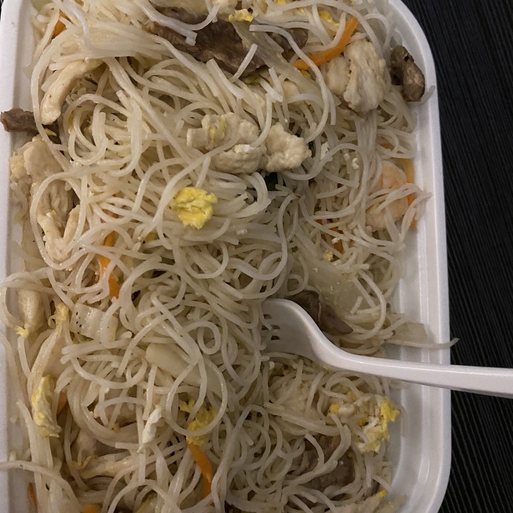a bowl of noodles and mushrooms a bowl of noodles and mushrooms