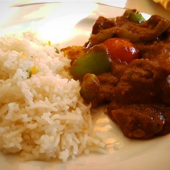 Ambar India Restaurant - Lamb Do Piaza- lamb smothered with tomatoes, onions, and spices. Served with Basmati rice. - Indian Near Me - Cincinnati, Ohio Ambar India Restaurant - Lamb Do Piaza- lamb smothered with tomatoes, onions, and spices. Served with Basmati rice. - Indian Near Me - Cincinnati, Ohio