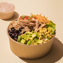 Fresh Greens & Proteins - Brown rice, Black Beans, Shredded Cheddar, Tortilla Strips, Pico de Gallo, Shredded Romaine, Corn Salsa, Avocado, Chipotle Mayo