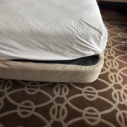 The Hotel at Argosy Casino - I guess when replacing mattresses they went smaller than the ones they previously had on the beds.