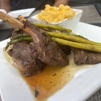 Papi Cuisine - Honey jerk lamb, asparagus, asiago mash with their mac and cheese - Cocktail Bars Near Me - Baltimore, Maryland