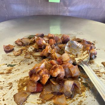 Indian Curry and Grill - A dish they keep on a fire burner. - Indian Near Me - Lodi, California Indian Curry and Grill - A dish they keep on a fire burner. - Indian Near Me - Lodi, California