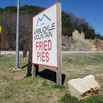 Arbuckle Mountain Fried Pies - A shy Big Foot behind the sign. Perfect for photos. - Bakeries Near Me - Davis, Oklahoma