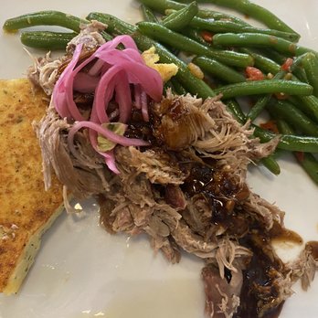 Texas Bistro - Roasted Duck with a Demi glaze, polenta cake, green beans - New American Near Me - New Braunfels, Texas Texas Bistro - Roasted Duck with a Demi glaze, polenta cake, green beans - New American Near Me - New Braunfels, Texas
