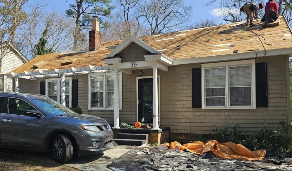 Slide of Woods Roofing and Remodeling