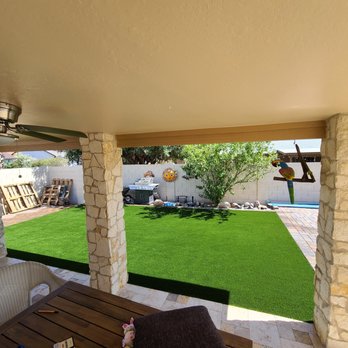 Outdoor Solutions - a patio with a green lawn - Landscaping Near Me - Mesa, Arizona Outdoor Solutions - a patio with a green lawn - Landscaping Near Me - Mesa, Arizona