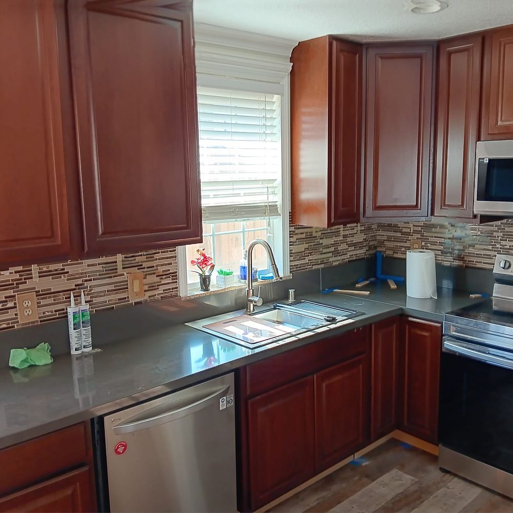 new cabinets, countertop and sink new cabinets, countertop and sink