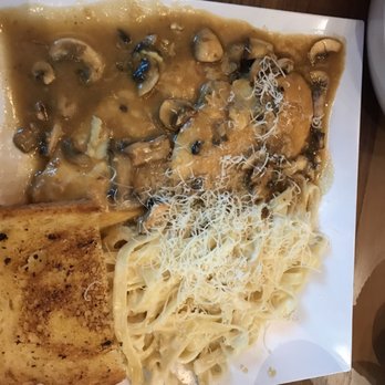Presto Pasta - Chicken Marsala with Fettucine Alfredo topped with freshly grated cheese. - Italian Near Me - Simi Valley, California Presto Pasta - Chicken Marsala with Fettucine Alfredo topped with freshly grated cheese. - Italian Near Me - Simi Valley, California