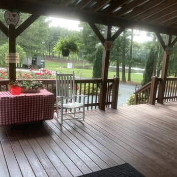 Millstone Creek Orchards - Rocking chairs on the porch - Fruits & Veggies Near Me - Ramseur, North Carolina Millstone Creek Orchards - Rocking chairs on the porch - Fruits & Veggies Near Me - Ramseur, North Carolina
