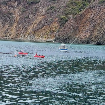 Mersea's - Kayakers and fishing boat - Bars Near Me - Avila Beach, California Mersea's - Kayakers and fishing boat - Bars Near Me - Avila Beach, California