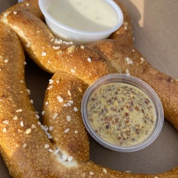 Good News Brewing Defiance - Pretzel with cheese sauce and mustard - Brewpubs Near Me - Defiance, Missouri Good News Brewing Defiance - Pretzel with cheese sauce and mustard - Brewpubs Near Me - Defiance, Missouri