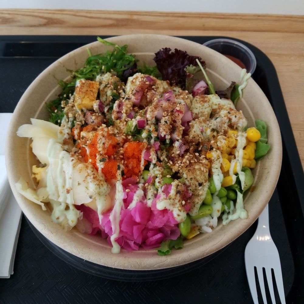 Spicy Tuna and Shrimp Poke Bowl with a little bit of all toppings and spicy mayo sauce. Spicy Tuna and Shrimp Poke Bowl with a little bit of all toppings and spicy mayo sauce.