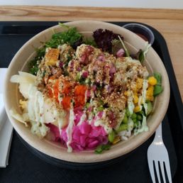 Spicy Tuna and Shrimp Poke Bowl with a little bit of all toppings and spicy mayo sauce.