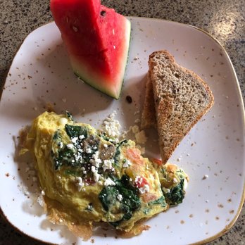 Lazy Dog - Veggie Omelet with a side of toast and watermelon. - New American Near Me - Las Vegas, Nevada Lazy Dog - Veggie Omelet with a side of toast and watermelon. - New American Near Me - Las Vegas, Nevada
