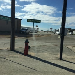Next to Kelly Tire sign