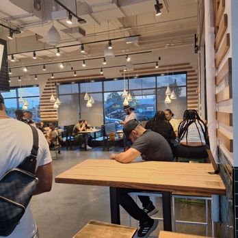 Shake Shack Bay Plaza - Nice amount of tables indoors - Burgers Near Me - Bronx, New York Shake Shack Bay Plaza - Nice amount of tables indoors - Burgers Near Me - Bronx, New York