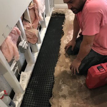 Abate Restoration - Installing a drainage system in a basement. - Damage Restoration Near Me - Lake Barrington, Illinois Abate Restoration - Installing a drainage system in a basement. - Damage Restoration Near Me - Lake Barrington, Illinois