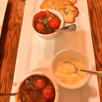 The Tavern Trattoria - BRUSCHETTA TRIO heirloom tomato, caponata, warm goat cheese fondue, crostini's - Italian Near Me - Laurie, Missouri The Tavern Trattoria - BRUSCHETTA TRIO heirloom tomato, caponata, warm goat cheese fondue, crostini's - Italian Near Me - Laurie, Missouri