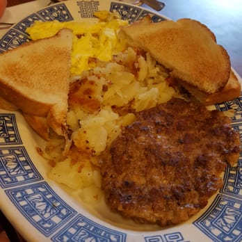 By The Way Cafe - Sausage patty and white buttered toast with sliced potatoes. - Food Near Me - East Rochester, Ohio By The Way Cafe - Sausage patty and white buttered toast with sliced potatoes. - Food Near Me - East Rochester, Ohio