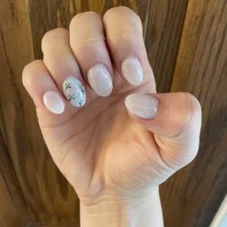 Artist Nails - Milky white base with a little blue flower design
