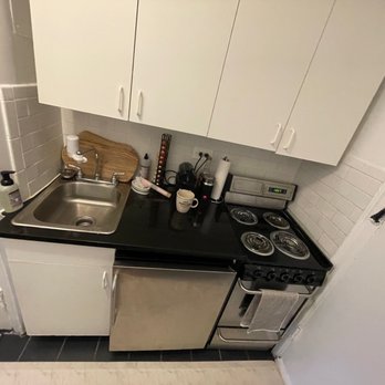 The Beaux Arts - Mini kitchen with small sink, mini fridge with freezer and electric stove - Apartments Near Me - New York, New York