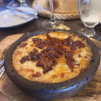 Bayshore Mediterranean Grill - Oven Baked Hummus: cheesy goodness - Mediterranean Near Me - Tampa, Florida Bayshore Mediterranean Grill - Oven Baked Hummus: cheesy goodness - Mediterranean Near Me - Tampa, Florida