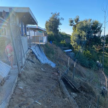 Second Wind Deck Master - Before (retaining wall collapse) - Decks & Railing Near Me