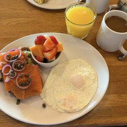 Sunset Grill - Salmon Avocado Toast, eggs, fruit, Fresh OJ from Florida and great coffee! What's not shown are the great staff and comforting atmosphere!