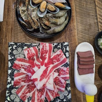 XhOtpOt — The Boiling House - Beef toro, seafood platter, duck blood - Hot Pot Near Me - Stanton, California XhOtpOt — The Boiling House - Beef toro, seafood platter, duck blood - Hot Pot Near Me - Stanton, California