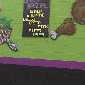 Z Brick Oven Pizza - a sign on the side of a building - Pizza Near Me - Huntington, West Virginia