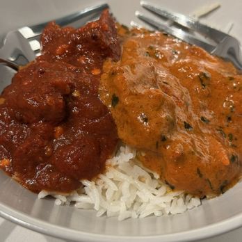 Adda Indian Cuisine - Lamb Vindaloo and Butter Chicken over jasmine rice - Indian Near Me - Chicago, Illinois Adda Indian Cuisine - Lamb Vindaloo and Butter Chicken over jasmine rice - Indian Near Me - Chicago, Illinois