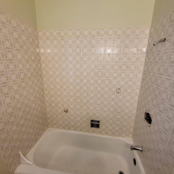 Lachcik Construction - a bathtub in a bathroom - Lawn Services Near Me - Forreston, Illinois