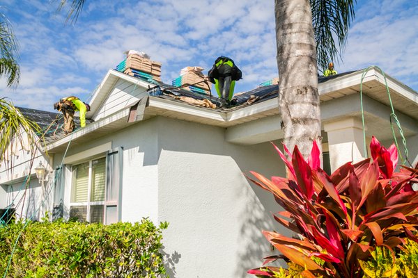 Keeping You Dry Roofing Logo