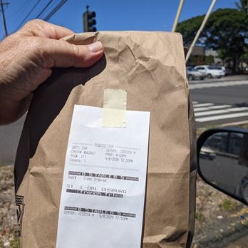 Nico's Pier 38 - Brown bag lunch plopped down for dine in service at sit down restaurant. - Seafood Near Me - Honolulu, Hawaii