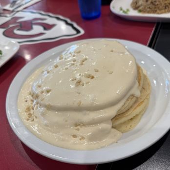 Boots & Kimo's Homestyle Kitchen - Buttermilk pancakes with the famous Mac nut sauce. - Hawaiian Near Me - Kailua, Hawaii Boots & Kimo's Homestyle Kitchen - Buttermilk pancakes with the famous Mac nut sauce. - Hawaiian Near Me - Kailua, Hawaii