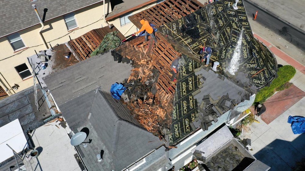 Slide of Rafael’s Tear-off & Hauling