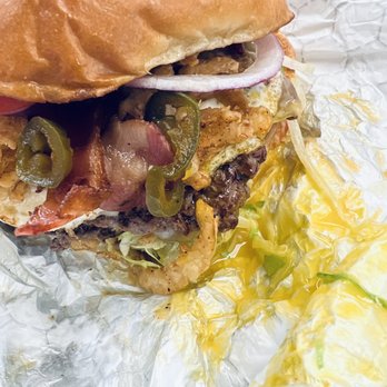 Tony Beef - A cheddar cheese burger with lettuce, tomato, onions, onion straws, candied jalapeños, bacon, Mayo, mustard, ketchup and a fried egg - Burgers Near Me - Somers Point, New Jersey Tony Beef - A cheddar cheese burger with lettuce, tomato, onions, onion straws, candied jalapeños, bacon, Mayo, mustard, ketchup and a fried egg - Burgers Near Me - Somers Point, New Jersey