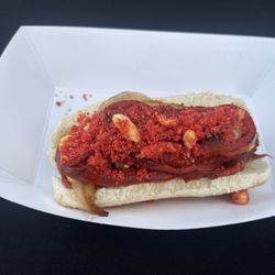 Street Hotdogs Los Oseguera - Bacon-wrapped, bellpeppers , grilled onions, and HOT CHEETOS