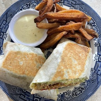 Uncle Wolfie’s Breakfast Tavern - Chorizo fundito burrito with fries - Breakfast & Brunch Near Me - Milwaukee, Wisconsin