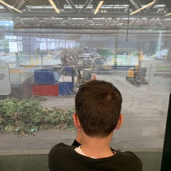 North Transfer Station - Little person looking out of the viewing room - Recycling Center Near Me - Seattle, Washington