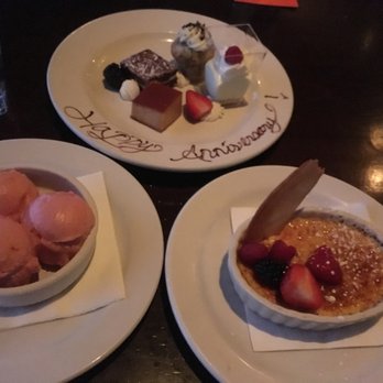 Orange Hill Restaurant & Events - We were given complementary anniversary dessert. But we also ordered strawberry lemonade sorbet plus creme brulet. - Steakhouses Near Me - Orange, California Orange Hill Restaurant & Events - We were given complementary anniversary dessert. But we also ordered strawberry lemonade sorbet plus creme brulet. - Steakhouses Near Me - Orange, California