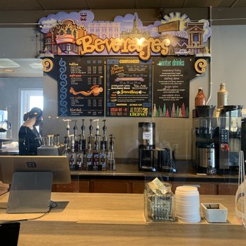 Java Haute - a coffee shop counter with a menu on the wall - Coffee & Tea Near Me - Terre Haute, Indiana