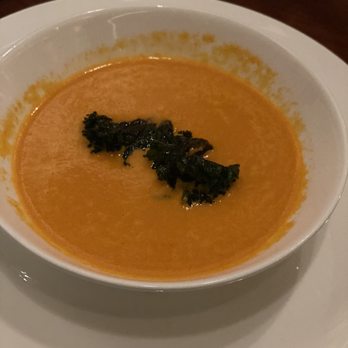 The Hive - Creamy Tomato Soup, topped with spiced kale - Southern Near Me - Bentonville, Arkansas