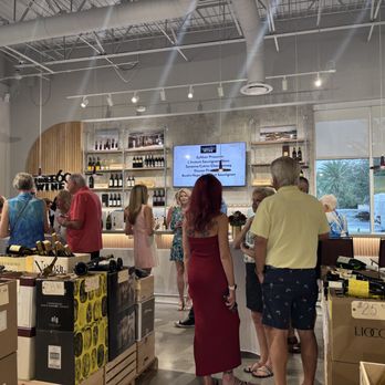 The Wine Circle - Long bar with the wines being tasted displayed on the monitor, - Wine Tasting Classes Near Me The Wine Circle - Long bar with the wines being tasted displayed on the monitor, - Wine Tasting Classes Near Me